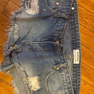 Distressed jean shorts